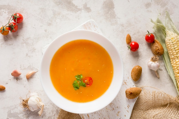 Free photo flat lay pumpkin soup bowl