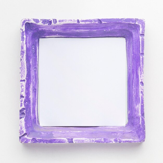 Flat lay of purple frame concept with copy space