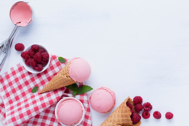 Flat lay of raspberries ice cream