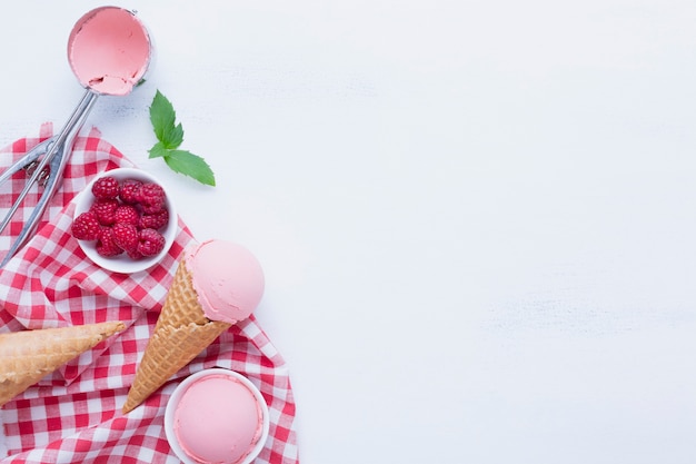 Flat lay of raspberries ice cream