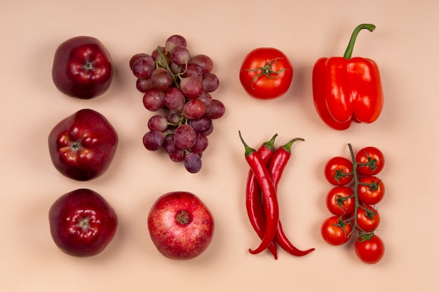 Flat lay red fruits and vegetables