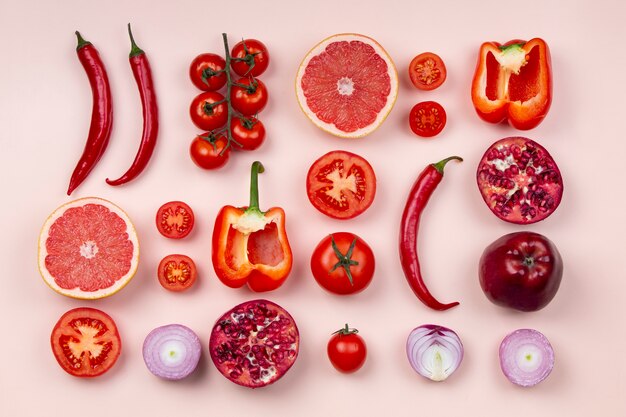 Flat lay red fruits and vegetables