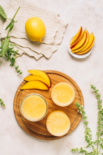 Flat lay refreshing mango smoothies