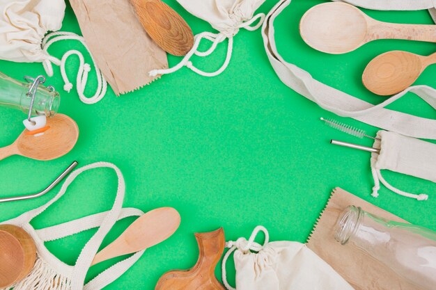 Flat lay of reusable bags with wooden spoons