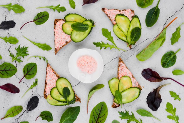 Flat lay roe on bread with cucumbers