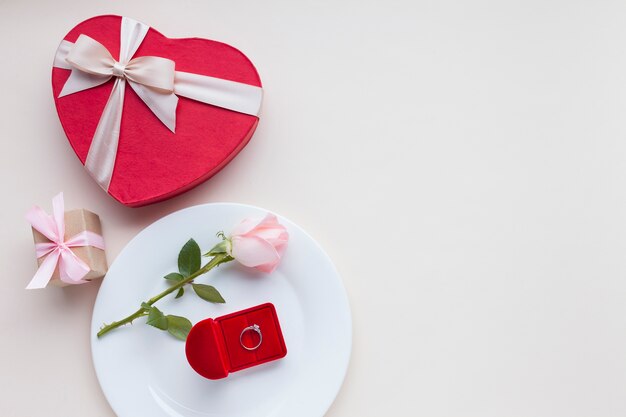 Flat lay romantic arrangement on white background