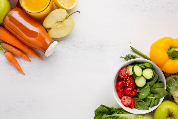 Flat lay of salad and groceries