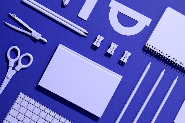flat lay of school supplies for education day