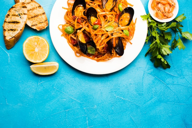 Flat-lay seafood dishes with copyspace