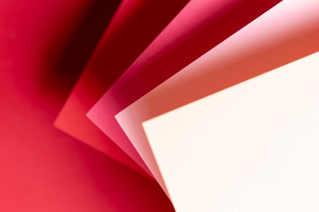 Flat lay shades of red papers close-up