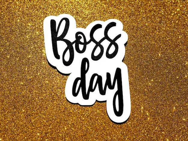 Flat lay sign with boss day with glitter