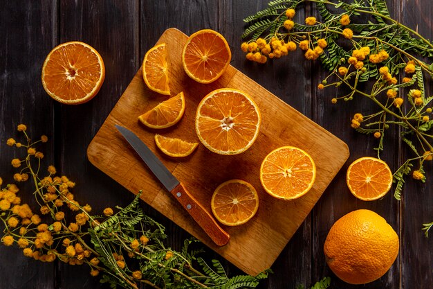 Flat lay of sliced citrus fruits