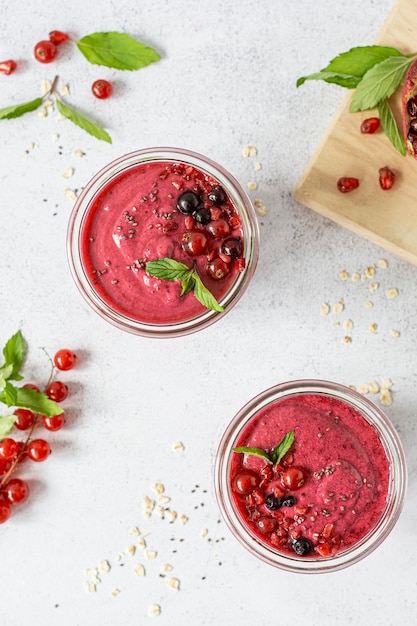flat lay smoothie glasses with fruits