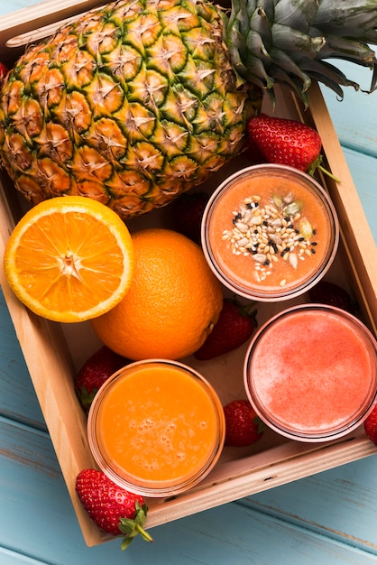 Free photo flat lay smoothies in box