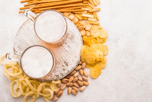 Flat lay snacks and beer arrangement