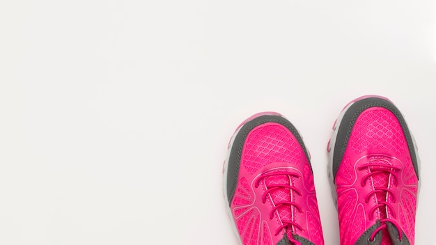 Flat lay of sneakers with copy space