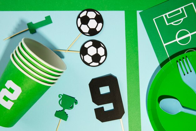 Flat lay soccer birthday items arrangement
