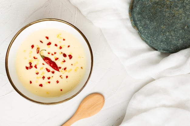 Flat lay soup with spicy red pepper  