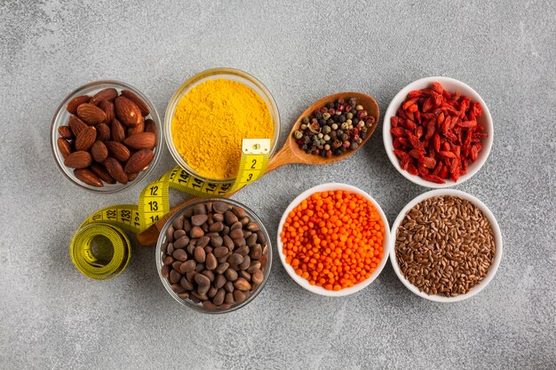 Flat lay of spices on slate background