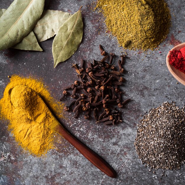 Flat lay spices on stucco background