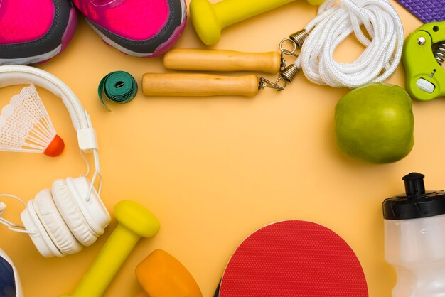 Flat lay of sport essentials and headphones