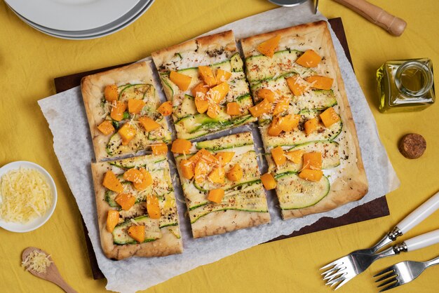 Flat lay square pizza on wooden board