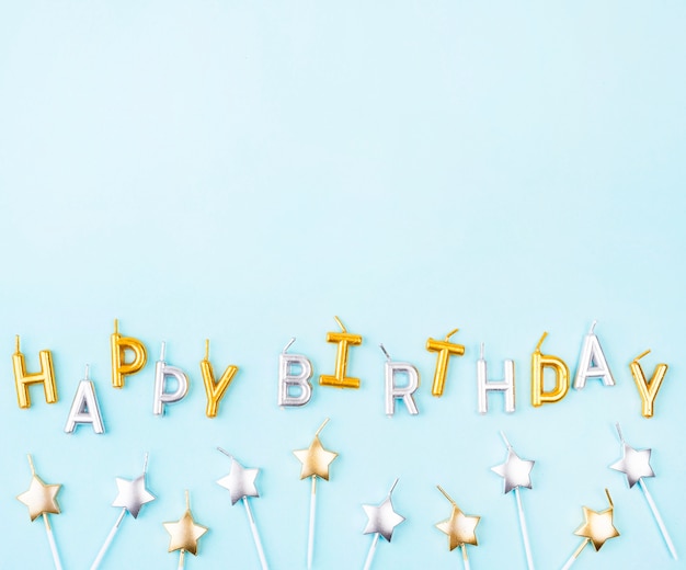 Free photo flat lay star shaped birthday candles