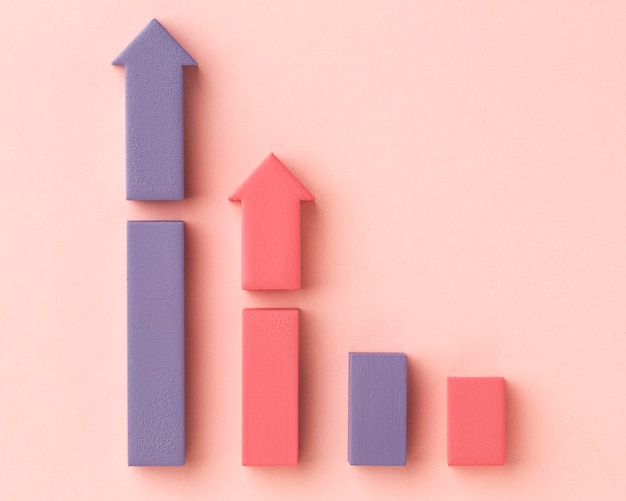 Flat lay of statistics presentation with chart and arrows