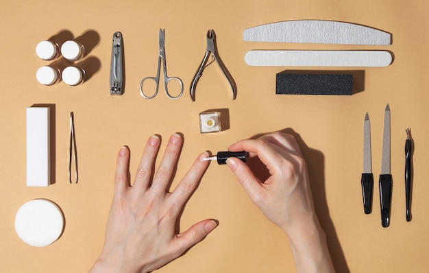 Free photo flat lay still life composition of nail care products