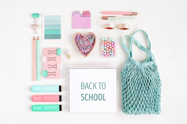 Flat lay stylish stationery set.  school supplies in pink and blue pastel color. back to school concept.