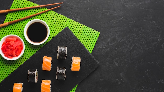 Free photo flat lay sushi arrangement with copy space