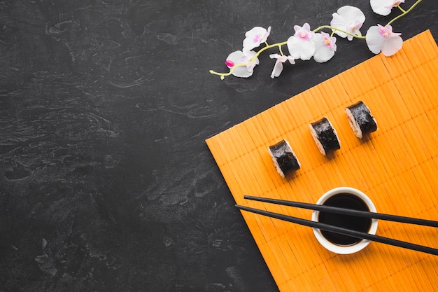 Free photo flat lay sushi arrangement with copy space