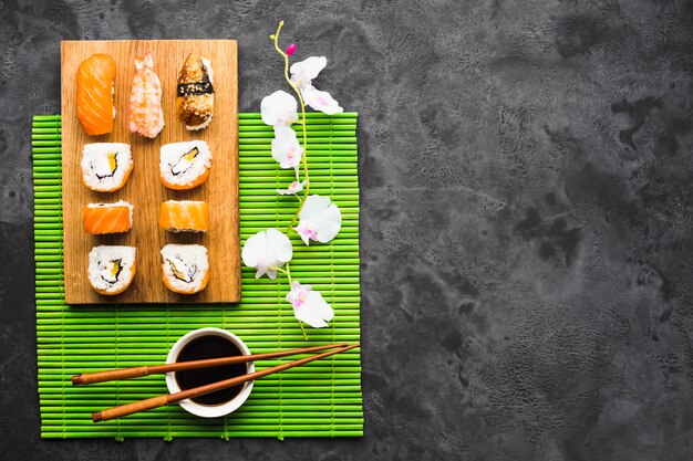 Flat lay sushi arrangement with copy space