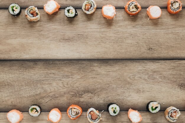 Free photo flat lay sushi composition with copyspace