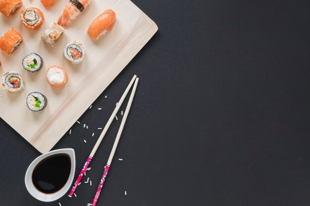 Flat lay sushi composition with copyspace