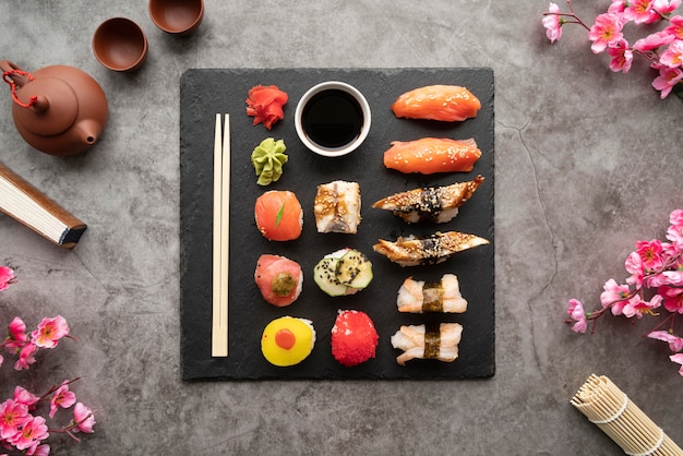 Free photo flat lay sushi meal arrangement