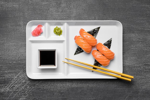 Flat lay sushi and sauce on plate