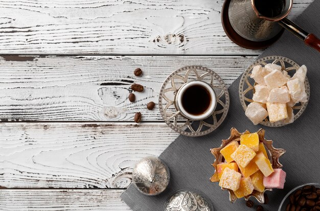 Flat lay sweets and coffee cup