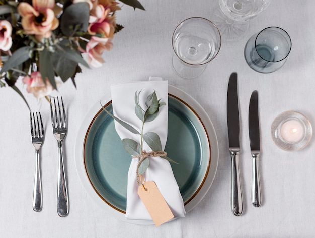 Flat lay table arrangement with flowers