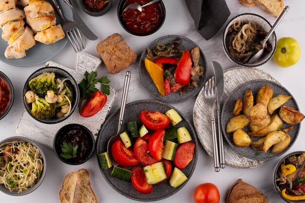 Flat lay table full of delicious food arrangement