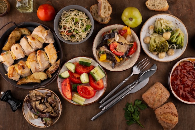 Flat lay table full of delicious food arrangement