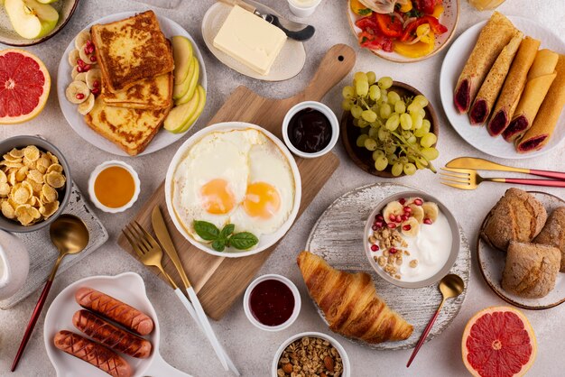 Flat lay table full of delicious food composition