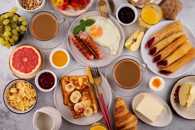 Flat lay table full of delicious food composition