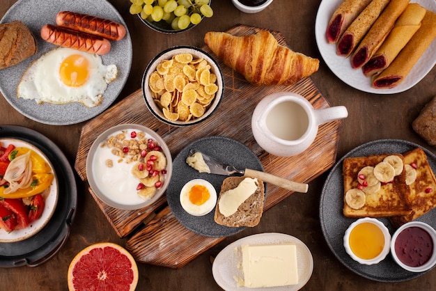 Flat lay table full of delicious food composition