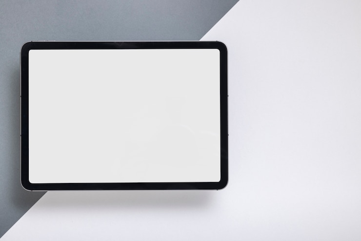 Free Photo flat lay tablet with minimal display