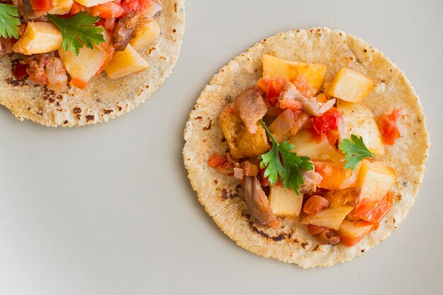 Flat lay tacos on white background