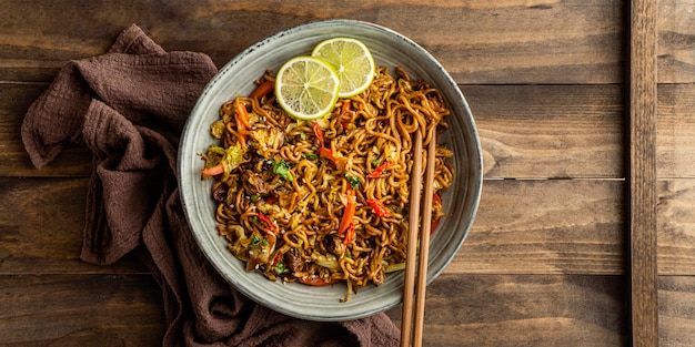 Flat lay tasty composition of noodles on a table