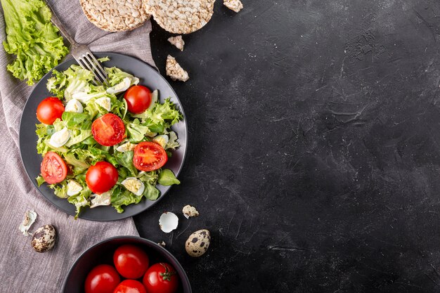 Flat lay tasty fresh salad with copy space