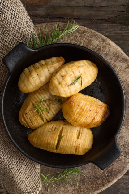 Flat lay tasty potatoes in bowl