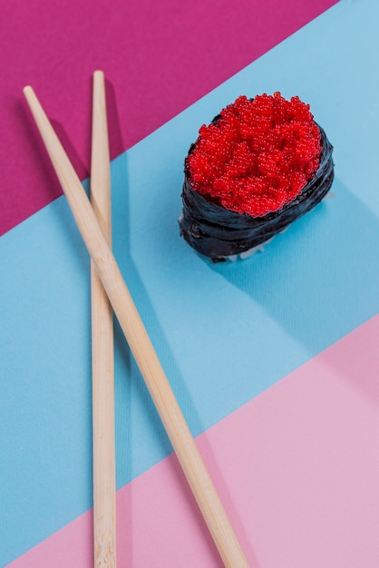 Free photo flat lay tasty sushi roll